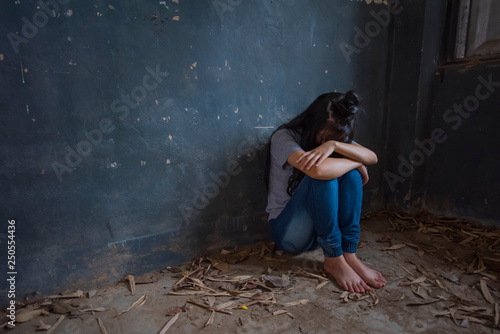 Drug addict young woman with syringe in action, Drug abuse concept.