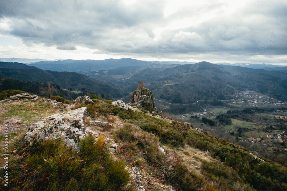 Obraz premium Medival tower ruins built on a rock