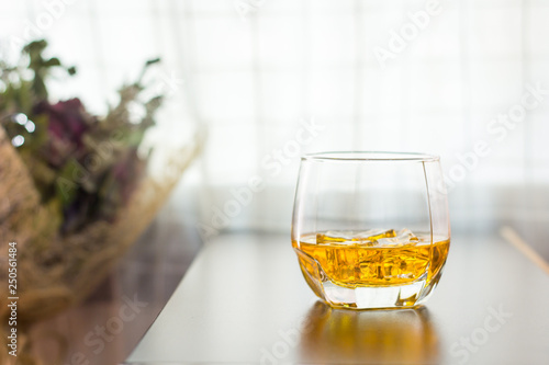 glass of whisky on the table background