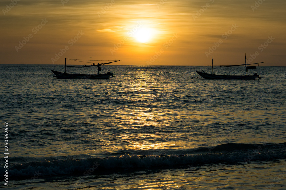 Sunset view on the beach of Jimbaran in Bali, Indonesia