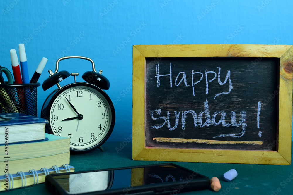 Happy Sunday! Planning on Background of Working Table with Office Supplies. Business Concept Planning on Blue Background Happy Sunday! Planning on Background of Working Table with Office Supplies. Business Concept Planning on Blue Background