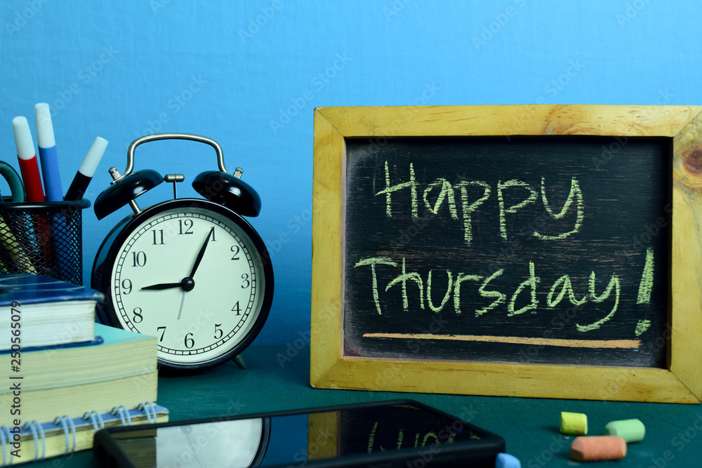 Happy Thursday! Planning on Background of Working Table with Office Supplies. Business Concept Planning on Blue Background Happy Thursday! Planning on Background of Working Table with Office Supplies. Business Concept Planning on Blue Background