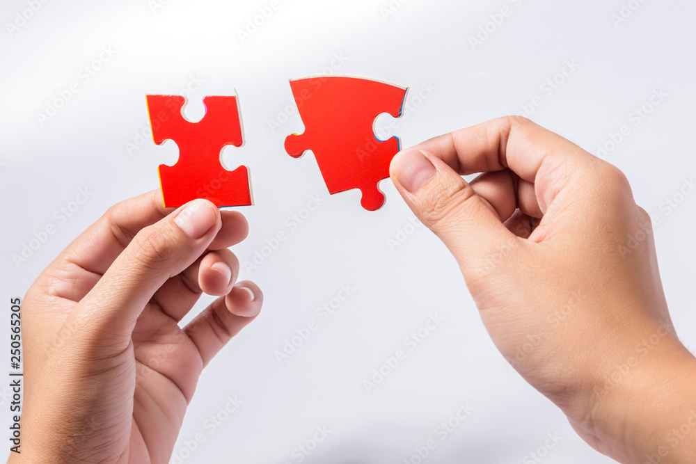 Pieces of jigsaw puzzle in woman's hands Pieces of jigsaw puzzle in woman's hands