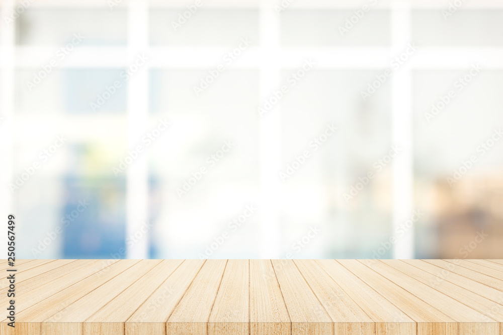 Wood table top on with blur glass window wall background. Wood table top on with blur glass window wall background.