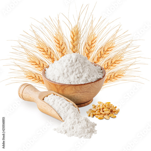 Bowl of white wheat flour and ears isolated