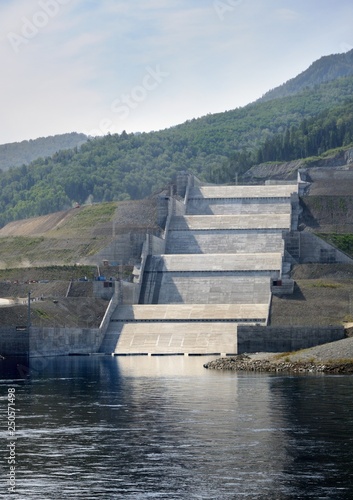 Spillway of the Sayano–Shushenskaya hydro power plant dam on the Yenisei river in Siberia, Russia photo