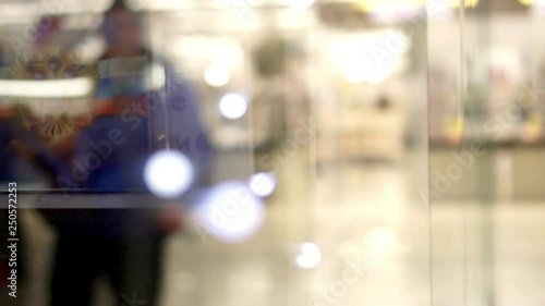 Wallpaper Mural Blurred background interior shopping center mall. Blurry backdrop corridor people bokhe. Torontodigital.ca