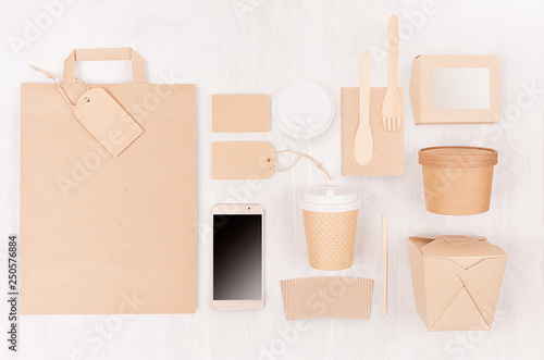 Food takeaway set mockup for brand - different container and box of kraft paper for asian cuisine, blank screen phone, bag, coffee cup on white wood board.