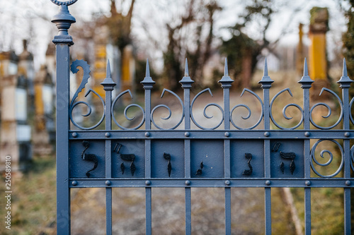 Hebrew text on the gate at the entrance to Jewish cemetery in Quatzenheim near Strasbourg photo