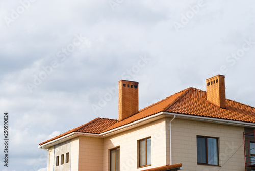 Ceramic Tiled Roof On House