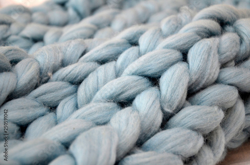 Hand Dyed Merino Wool. Close-up of knitted blanket, merino wool background