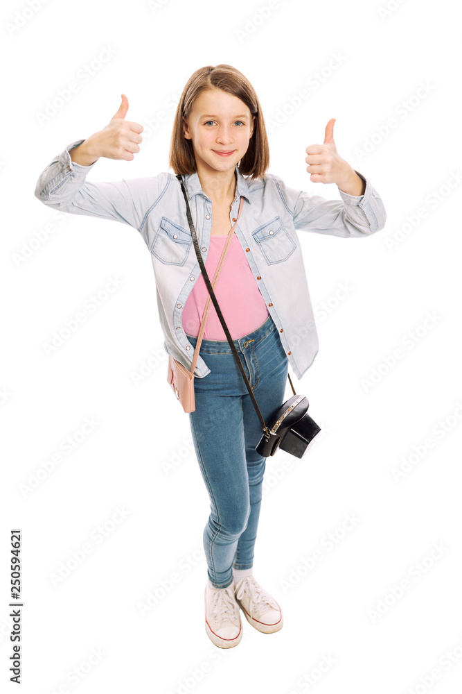 Teen girl with a camera, full length, isolated on white background Teen girl with a camera, full length, isolated on white background