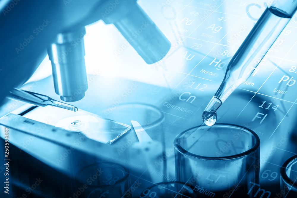 microscope and dropping chemical liquid to test tubes with lab glassware, science laboratory research and development concept in blue tone microscope and dropping chemical liquid to test tubes with lab glassware, science laboratory research and development concept in blue tone