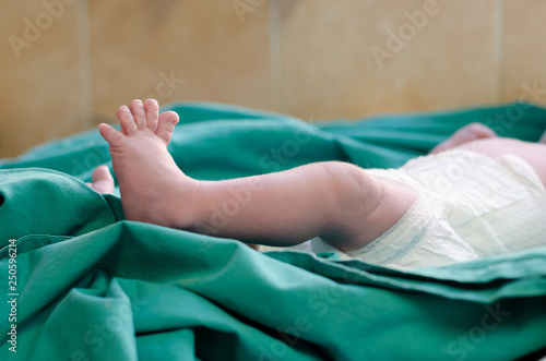 A close up of a newborn baby's foot in the neonatal unit in hospital