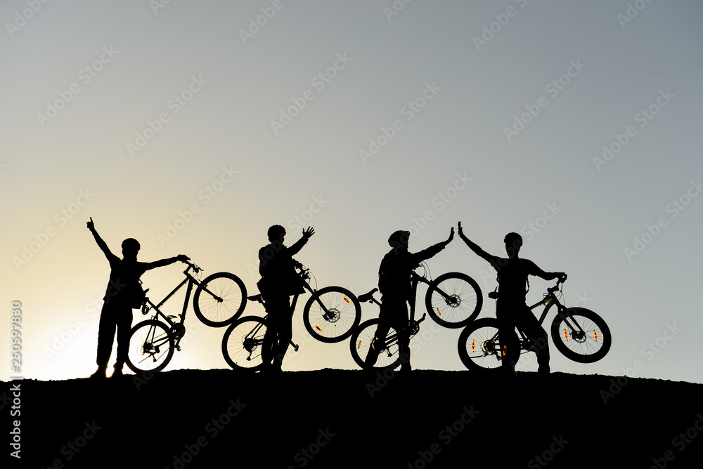 Obraz premium cheerful, fun and energetic cyclists