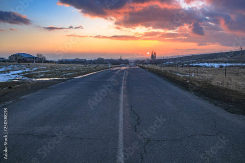 beautiful sunset with road