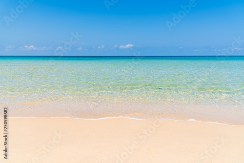 tropical beach and sea with blue sky, vacation concept  © totojang1977