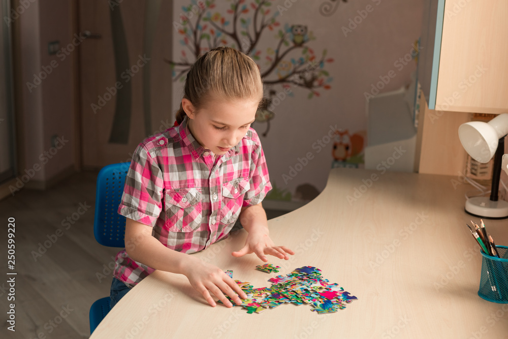 Cute little girl solving puzzle together Cute little girl solving puzzle together