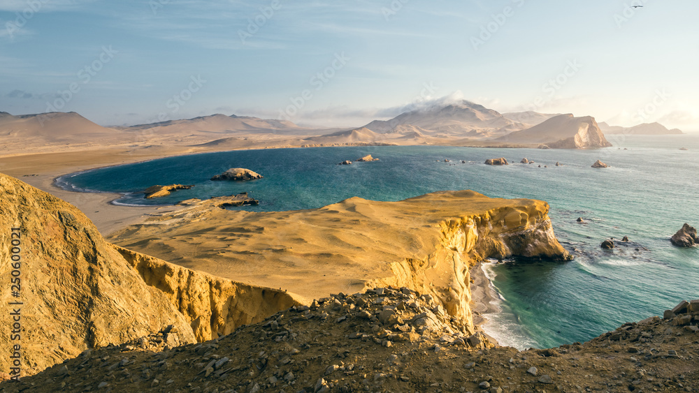 Panoramic view of the coast of Paracas in Peru during the sunset, panoramic view of the coast and the desert