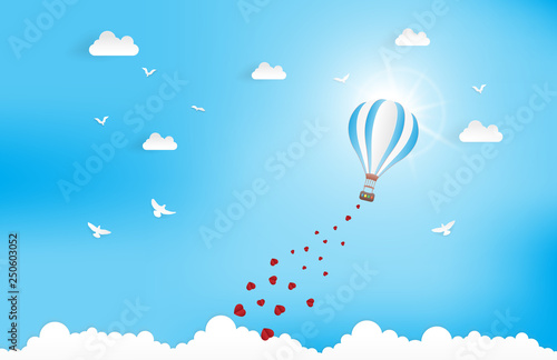 Balloon flying over Cloud with heart float on the sky. and scatter heart in the sky  vector art and illustration of love and valentine  Digital paper craft style.Paper art of blue background.