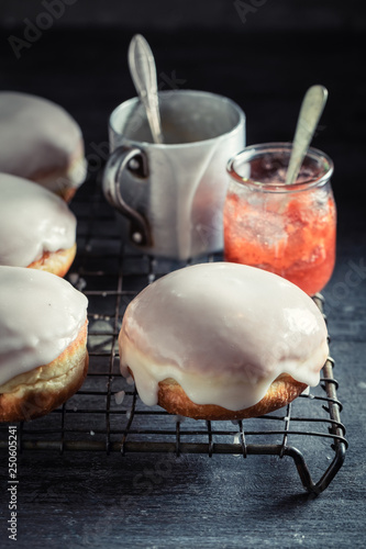 Tasty and homemade donuts with red jam