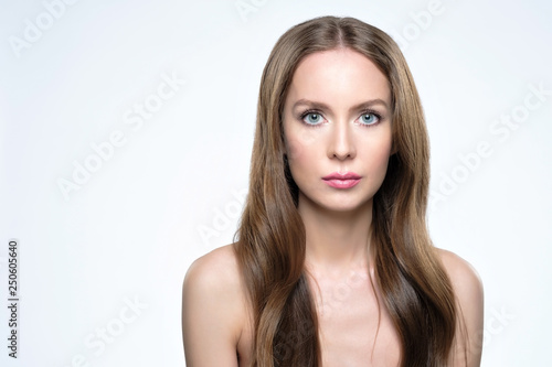 Girl with long and shiny hair. Beautiful model woman with good hairstyle