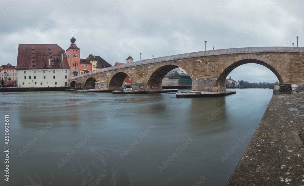 January - 2019. Panorama view from Danube and Stone Bridge in Regensburg, Germany