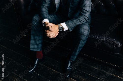 Closeup fashion image of luxury watch on wrist of man.body detail of a business man.