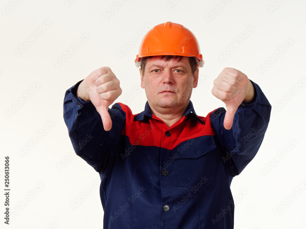 man in builder overalls on white background. man in builder overalls on white background.