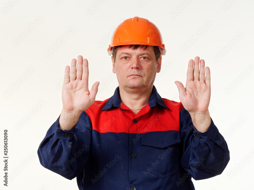 man in builder overalls on white background. man in builder overalls on white background.