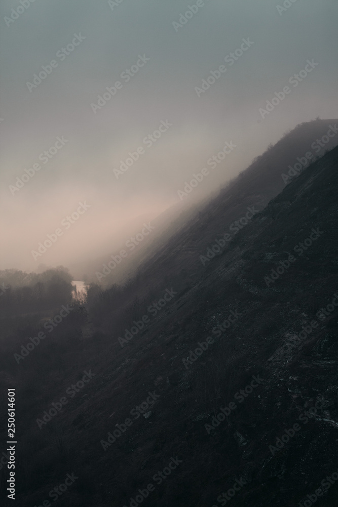 mountains in fog