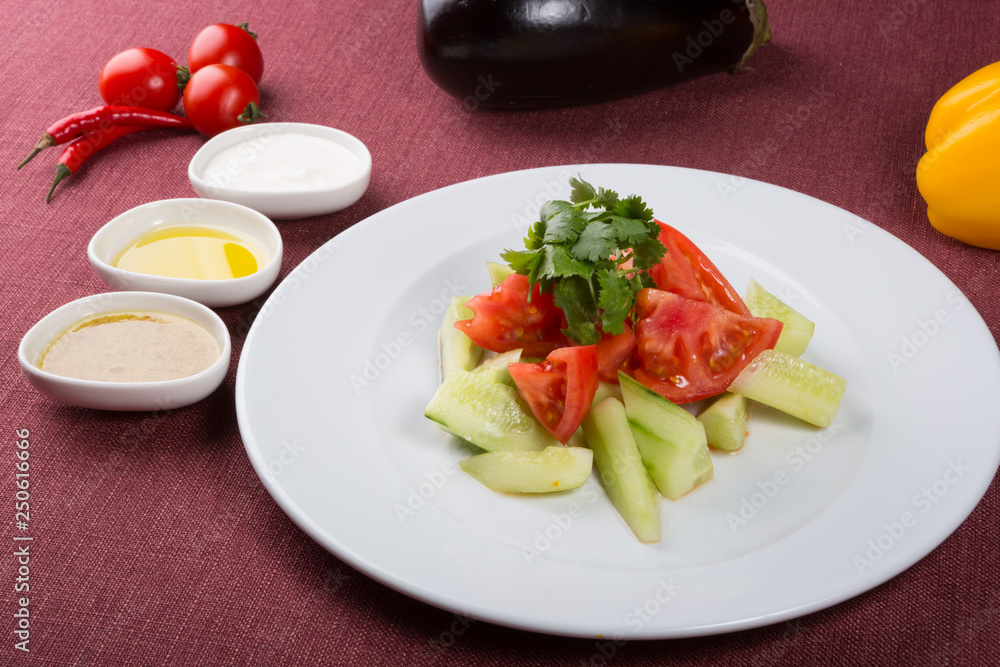 Mixed raw cucumber and tomato salad Mixed raw cucumber and tomato salad