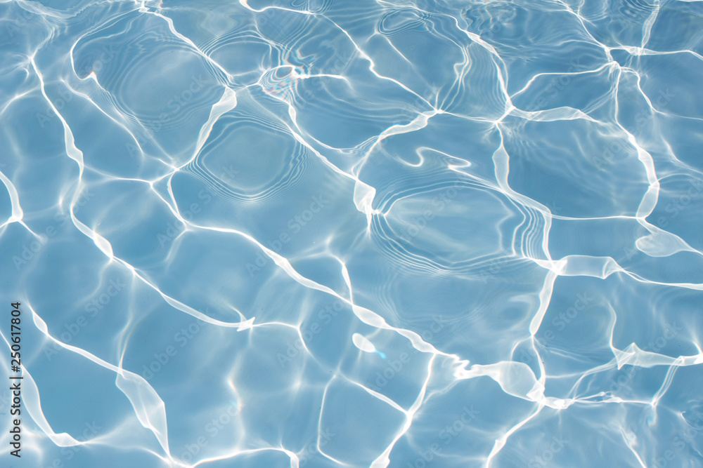 Fototapeta premium Texture of water in swimming pool for background