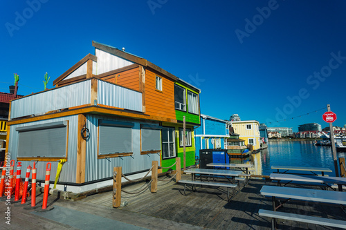 Colrful floating homes on a sunny day.