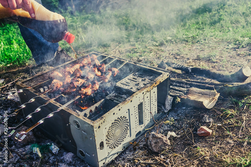 Wallpaper Mural a picnic with a fire and a grill in the old computer case Torontodigital.ca