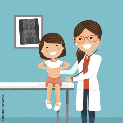 Pediatrician woman doctor examining a little girl