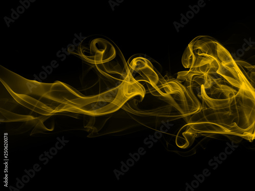 abstract yellow smoke on black background. fire design