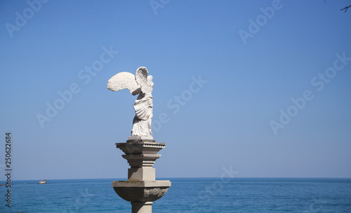 Statue of Winged Victory of Samothrace (called Nike of Samothrace) in the Park Aivazovsky in Crimea  © Igor Luschay