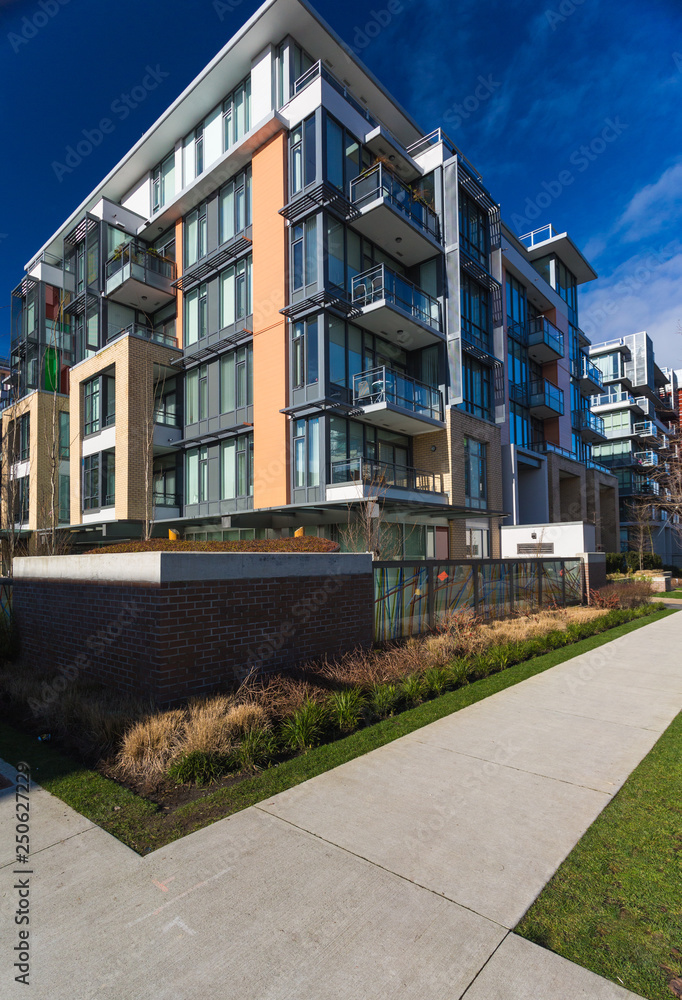 Obraz premium Low rise apartment building on sunny day in British Columbia, Canada