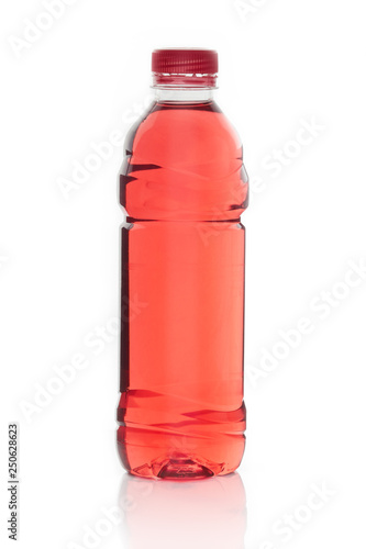 Red ice tea in plastic bottle isolated on white background
