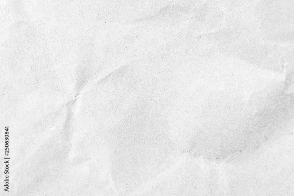 Obraz premium White crumpled paper texture background. Close-up.