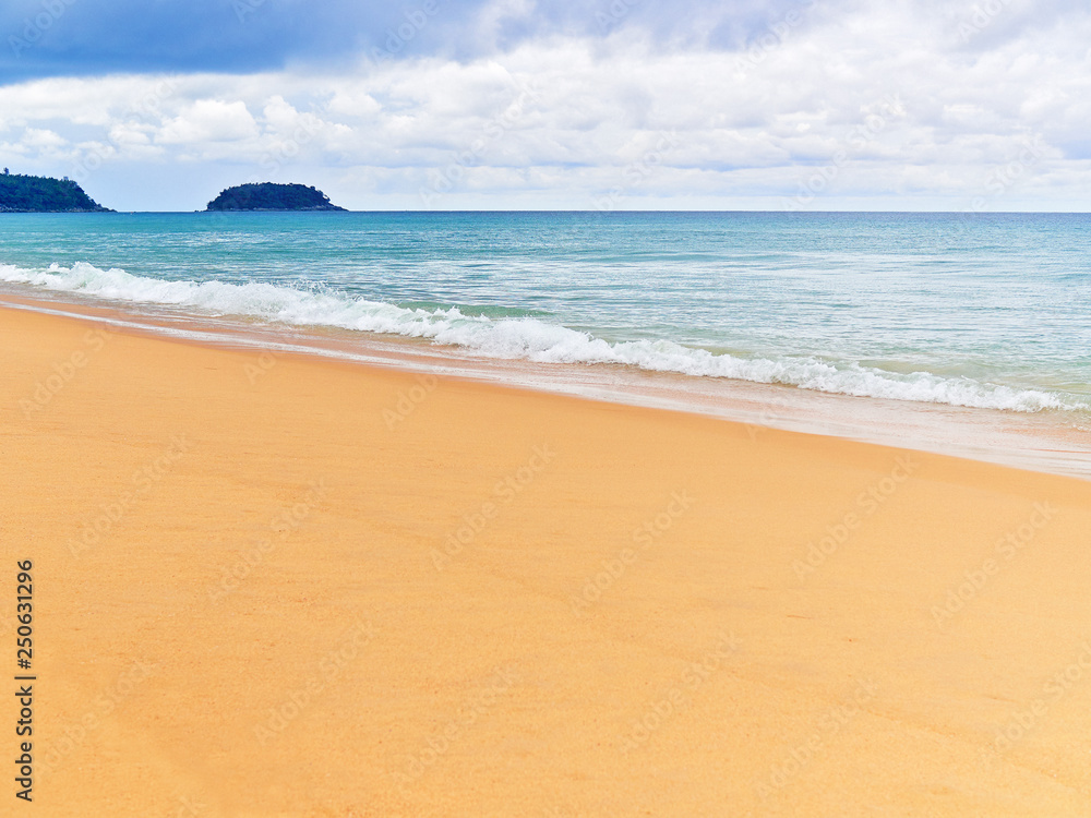 Obraz premium Karon Beach on Phuket Island (Thailand) in cloudy weather in November