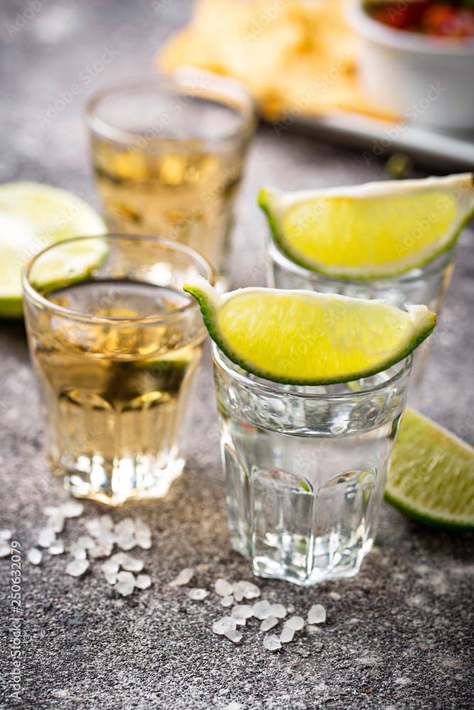 Shots of silver and gold tequila Shots of silver and gold tequila