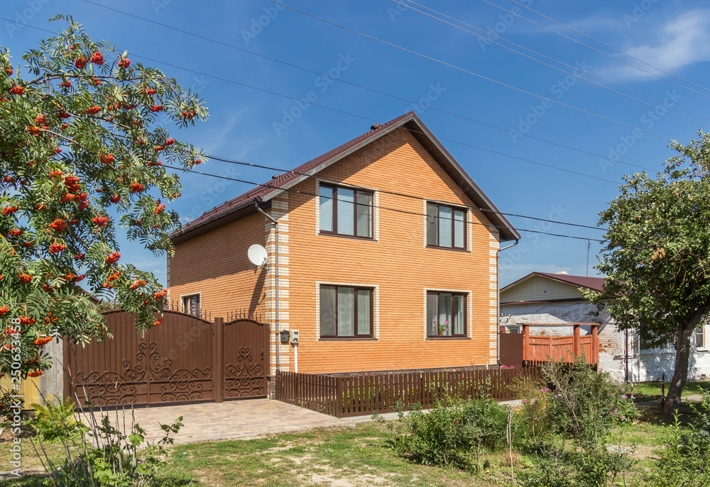 Two-storey brick house in the village
