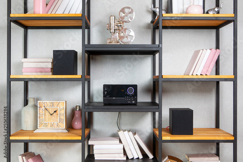 Compact CD radio player on the shelf in the vintage interior of the living room