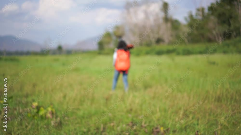 young Asian female with Backpack Enjoy travel Outdoors . young Asian female with Backpack Enjoy travel Outdoors .