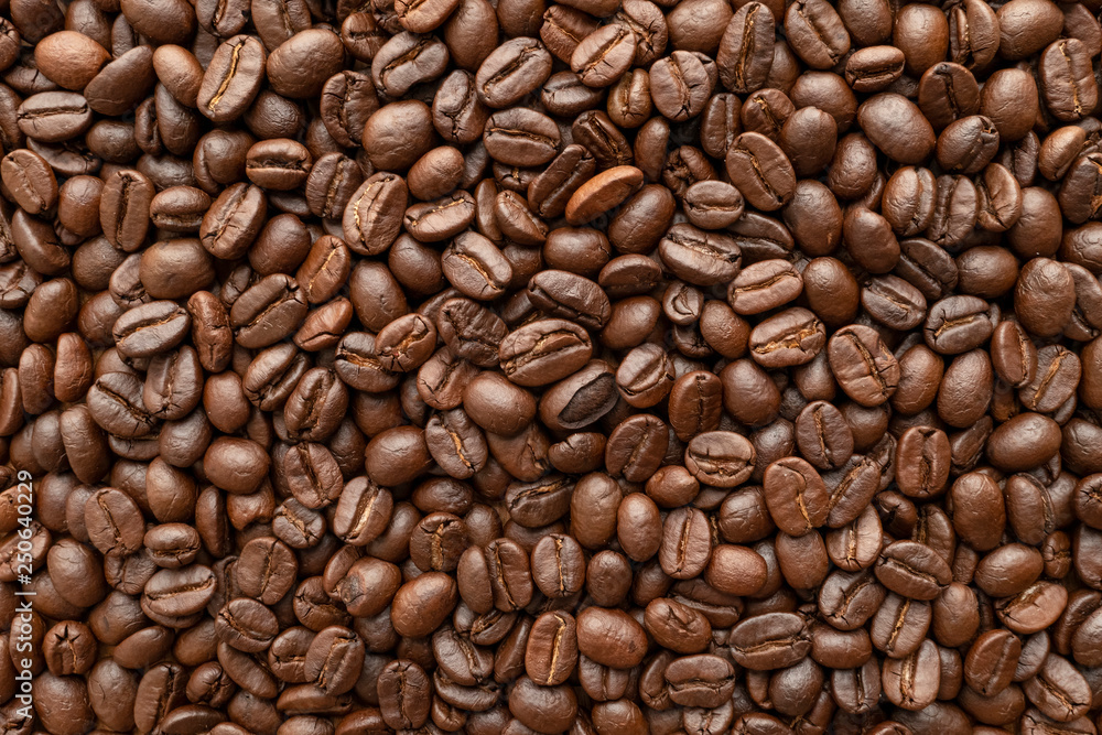 Roasted of coffee beans for background. Close-up. Roasted of coffee beans for background. Close-up.