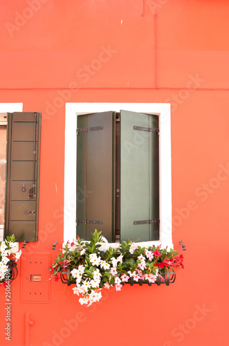 Mediterranean style. Colorful window on the island of Burano Venice Italy