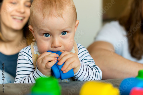 Baby boy playing with the toy