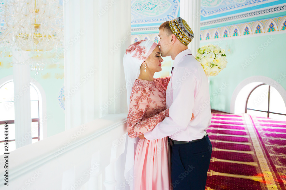 Foto de Muslim Wedding of a couple in mosque. Nikah do Stock Adobe Stock